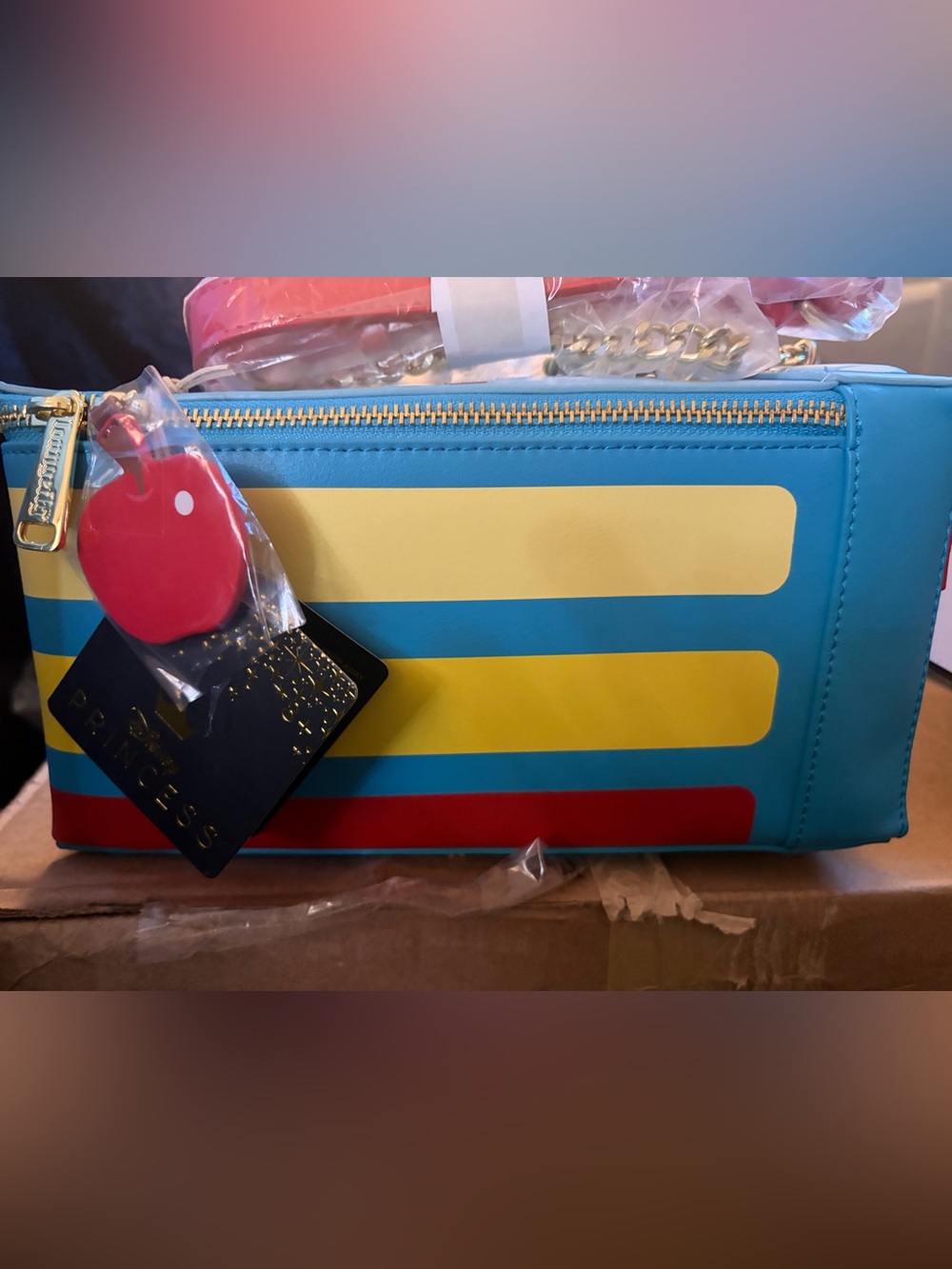 Loungefly Blue Yellow Red Striped Crossbody Bag with Apple Charm